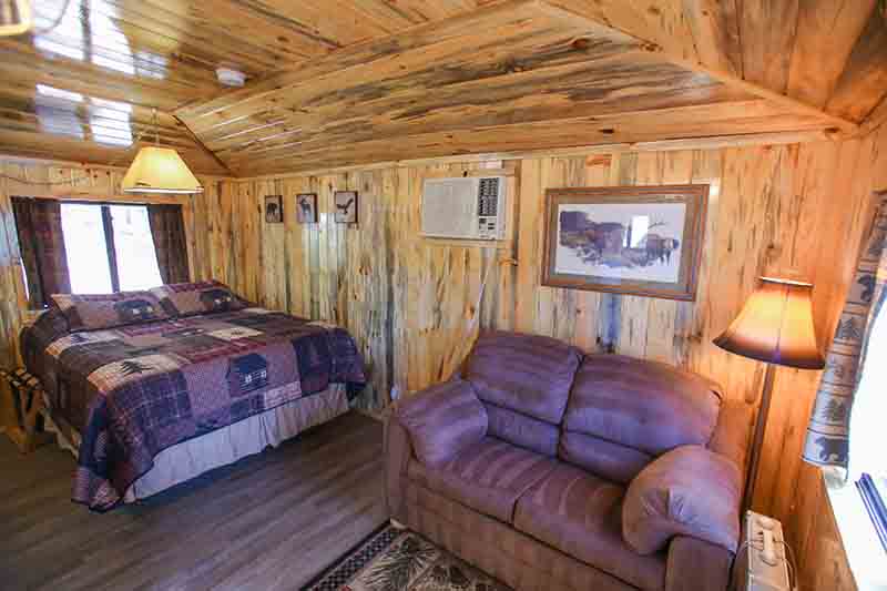 Cabins 16 & 17 bed and loveseat.